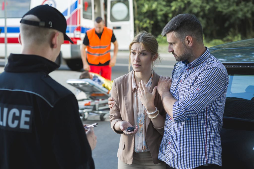 speaking to witness at scene of car accident