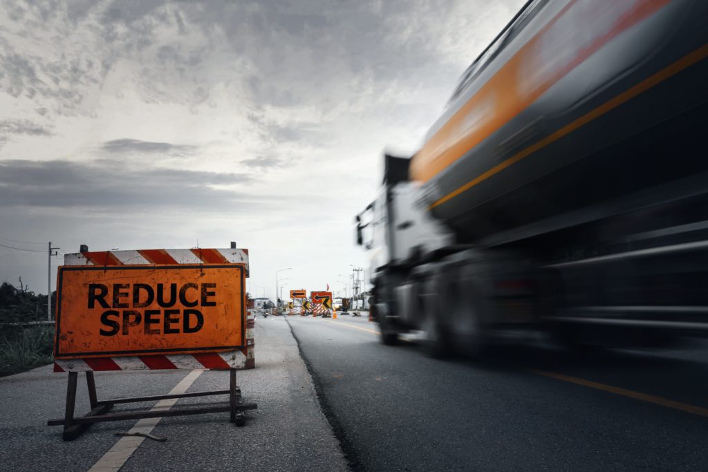 truck speeding with no control into construction site